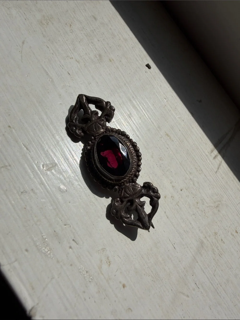 Vintage silver and garnet brooch